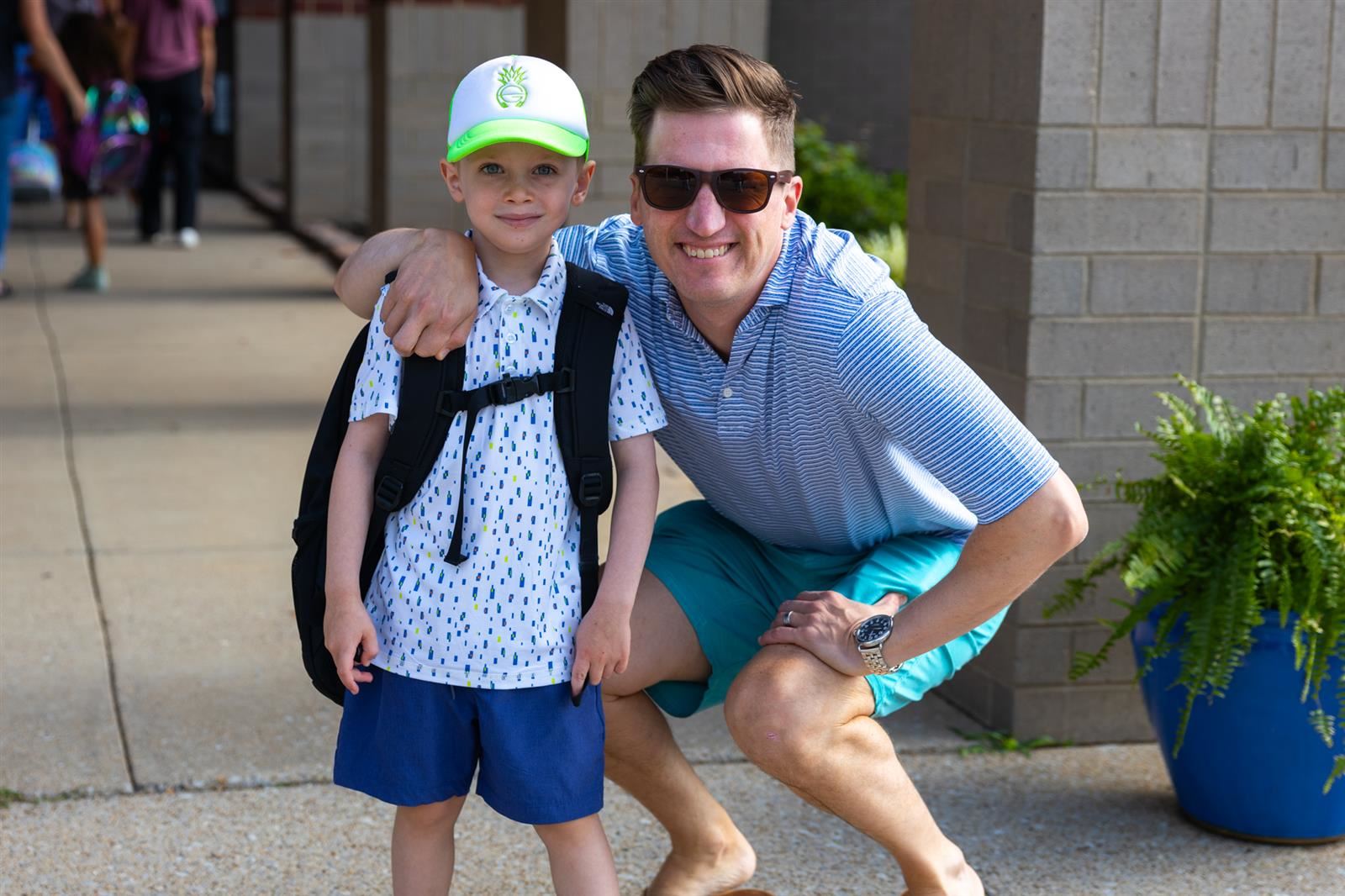 dad and son smiling